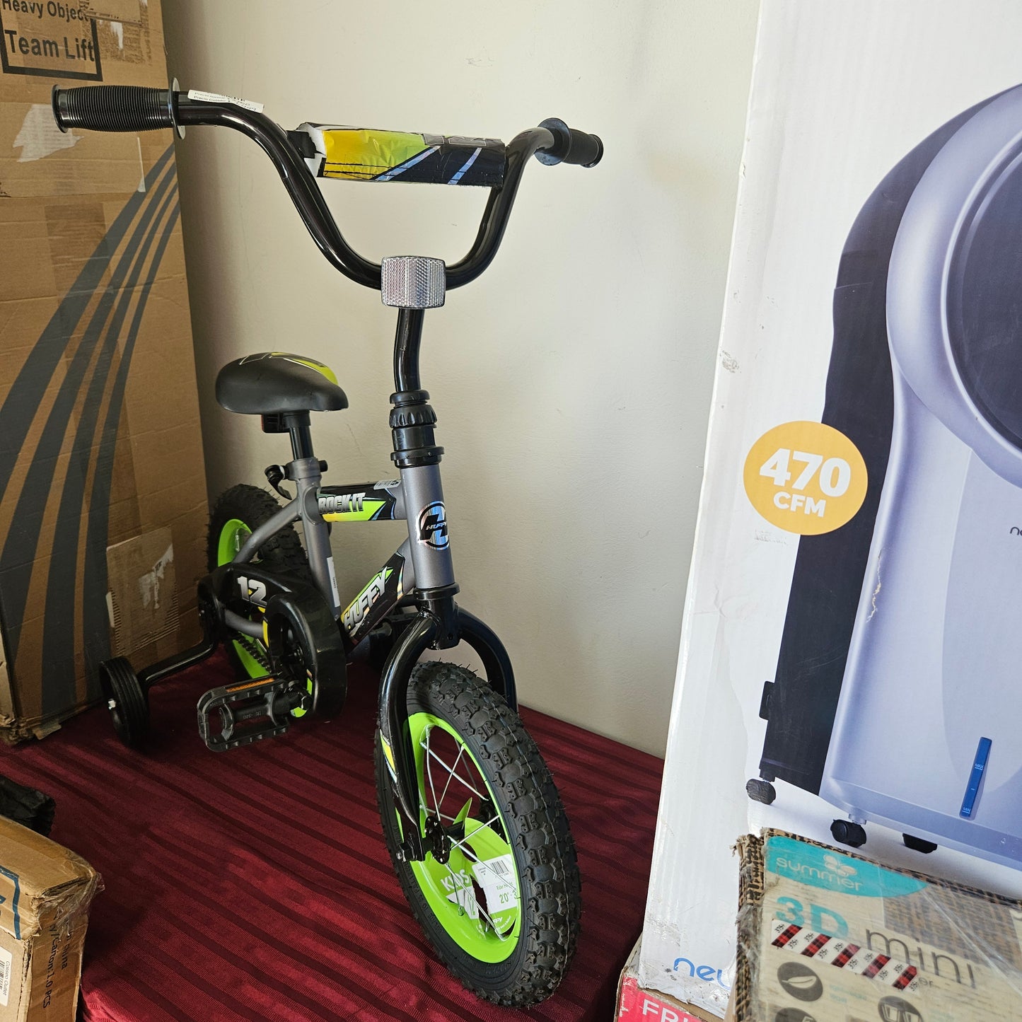 Bicicleta para niños 12" color gris con verde - Huffy Rock it (Nuevo, sin caja)