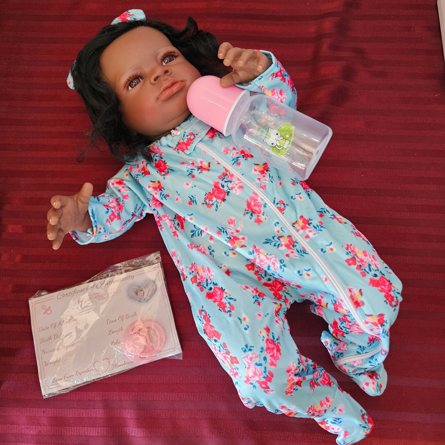 Bebé Reborn niña afroamericana ojos abiertos cuerpo de tela con cabello (Nuevo)