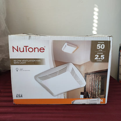 Extractor 50 pies cúbicos con lámpara - NuTone (Nuevo, caja abierta)