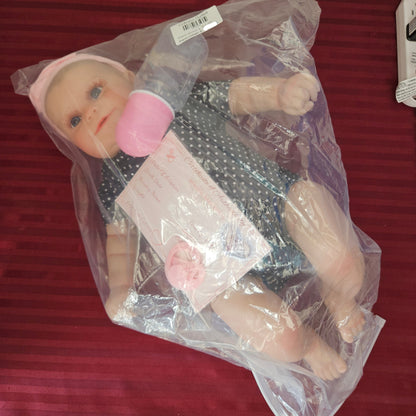 Bebé Reborn niña ojos abiertos cuerpo de tela (Nuevo)