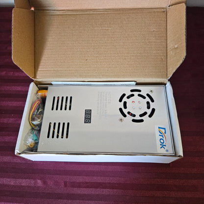 Fuente de alimentación AC 110V/220V a DC 0-24 V - Drok (Nuevo, caja abierta)